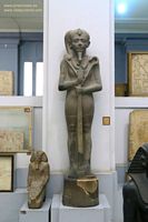 Estatua faraon oro Museo de El Cairo fotos im&aacute;genes